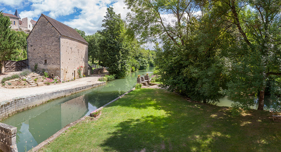 Seen from your cottage, the river, the mill stream, the barn and the village